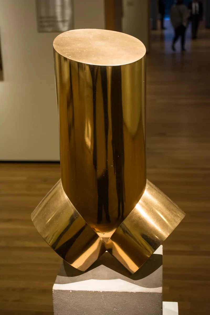 Male Torso, 1917 (brass) — a body reduced to three cylinders and still unmistakably a body.