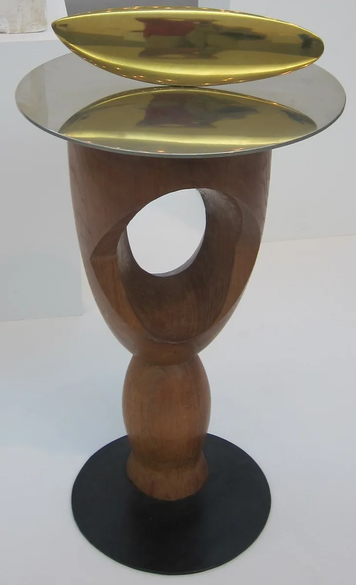 Fish, 1926 (bronze, metal and wood) — the disc turns, and the fish is made to swim.